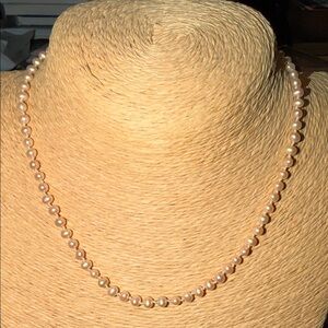 Pink fresh water hand knotted pearls on silk sterling silver toggle clasp